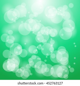 white bokeh with green background
