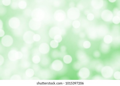White bokeh on greed background vector