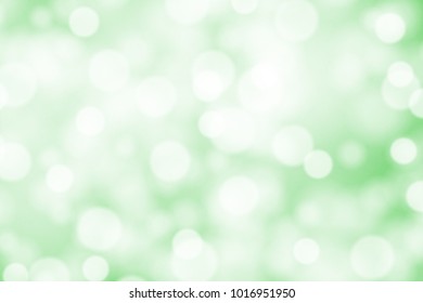 White bokeh on greed background vector