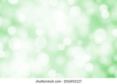 White bokeh on greed background vector
