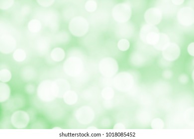 White bokeh on greed background vector