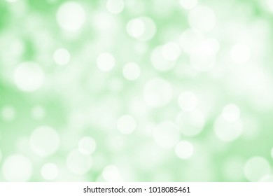 White bokeh on greed background vector