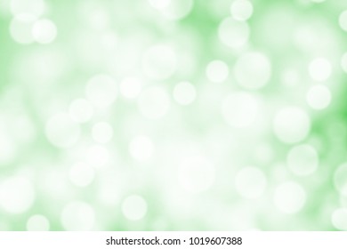 White bokeh on greed background vector