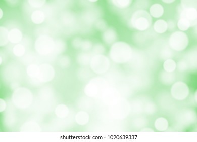 White bokeh on greed background vector