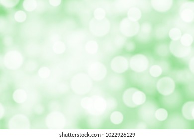 White bokeh on greed background vector