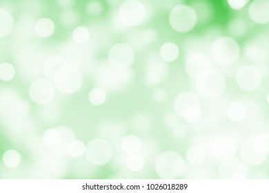 White bokeh on greed background vector