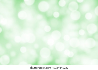 White bokeh on greed background vector