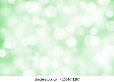 White bokeh on greed background vector
