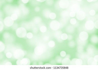 White bokeh on greed background vector