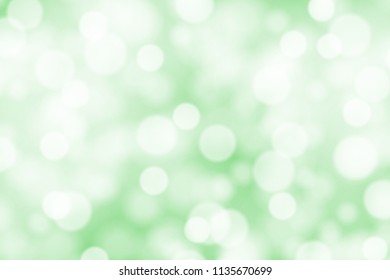 White bokeh on greed background vector