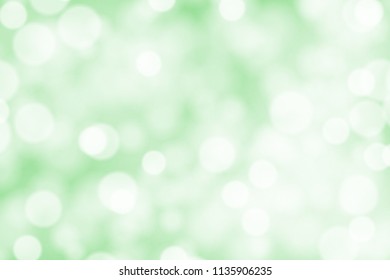 White bokeh on greed background vector