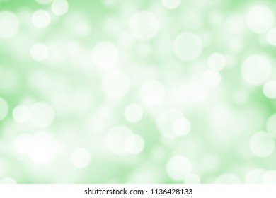 White bokeh on greed background vector