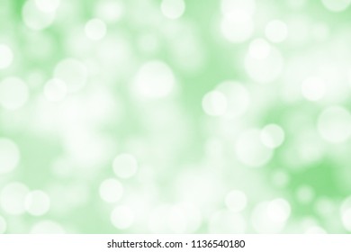 White bokeh on greed background vector