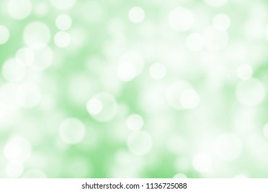 White bokeh on greed background vector