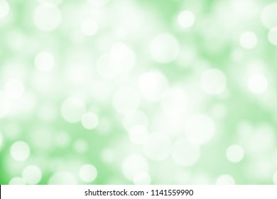 White bokeh on greed background vector