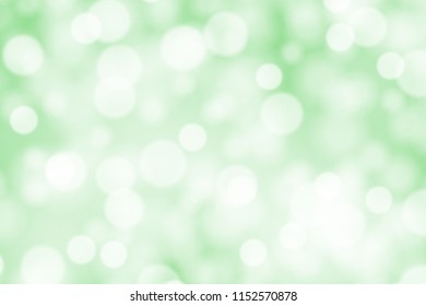 White bokeh on greed background vector