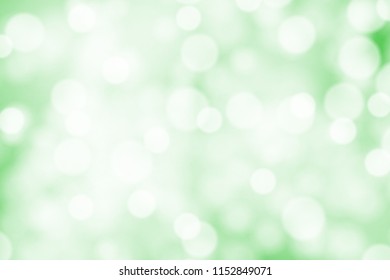 White bokeh on greed background vector