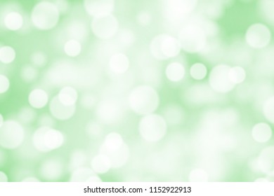 White bokeh on greed background vector