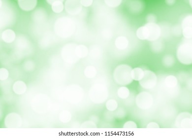 White bokeh on greed background vector