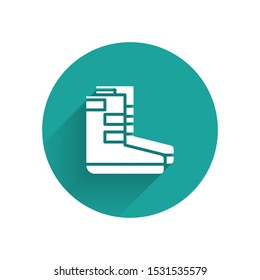 White Boots icon isolated with long shadow. Diving underwater equipment. Green circle button. Vector Illustration