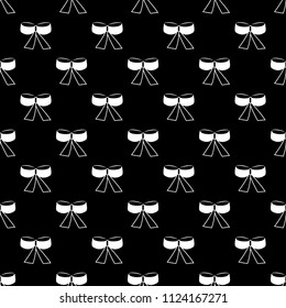White bow on black seamless pattern. Fashion graphic design. Modern stylish texture. Monochrome template for prints, textiles, wrapping, wallpaper, card, banner, business, etc. Vector illustration