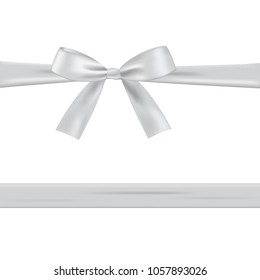 White bow with ribbon isolated on a white background