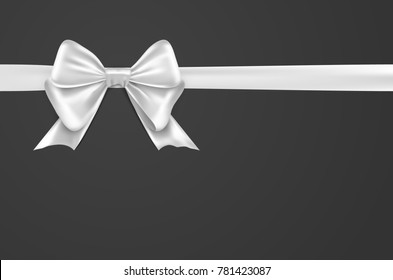 White bow ribbon on white background. White bow isolated gift decoration design for holiday.