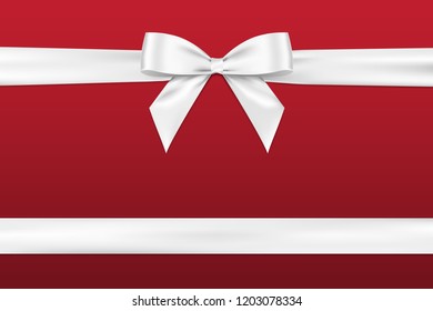 White bow shiny satin realistic and horizontal ribbon with shadow for decorate your greeting card or website, vector isolated on red background.