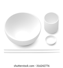 White bowl, chopsticks, dipping sauce cup and tea cup made from ceramic or wood