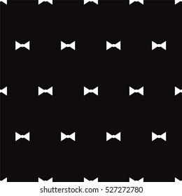 White bows on black background