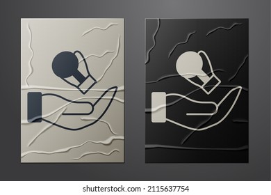 White Boxing glove icon isolated on crumpled paper background. Paper art style. Vector