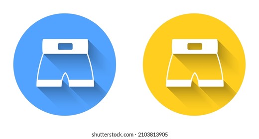 White Boxing short icon isolated with long shadow background. Circle button. Vector