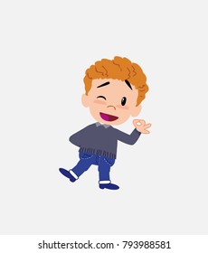 White boy in jeans doing the OK sign with his hand.																									