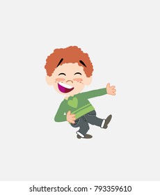 White boy in jeans laughing while teaching something to his left.																									