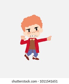 White boy in jeans points angrily to his left.																									