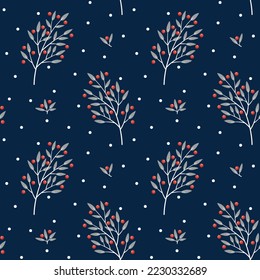 White branches with red winter berries on a dark blue background seamless pattern. Christmas wrapping paper.