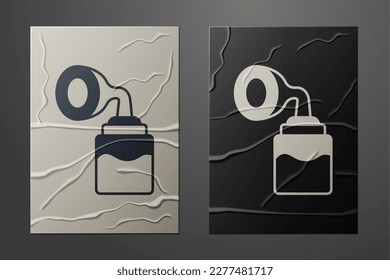 White Breast pump icon isolated on crumpled paper background. Paper art style. Vector