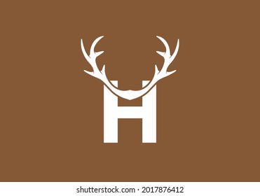 White brown color of H initial letter with deer horn design