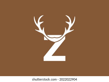 Weißbraune Farbe des Z-Anfangsbuchstaben mit Hirschhorndesign