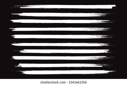 White brush stroke set isolated on black background. Trendy brush stroke for white ink paint, grunge backdrop, dirt banner, watercolor design and dirty texture. Creative art concept, vector illustration