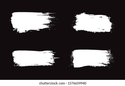 White brush stroke set isolated on black background. Trendy brush stroke for white ink paint, grunge splash, dirt banner, watercolor design and dirty texture.Creative art concept,vector illustration