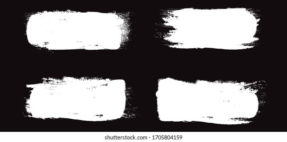 White brush stroke set isolated on black background. Trendy brush stroke vector for white ink paint, grunge backdrop, dirt banner, watercolor design and dirty texture. Brush stroke vector illustration