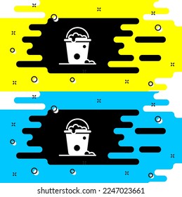 White Bucket with foam and bubbles icon isolated on black background. Cleaning service concept.  Vector