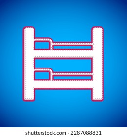 White Bunk bed icon isolated on blue background.  Vector