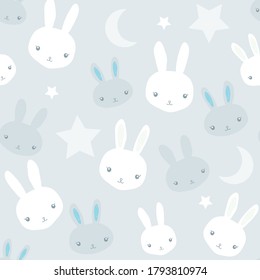 White bunnies and cute rabbits and stars for baby boy nursery seamless pattern on light blue background.