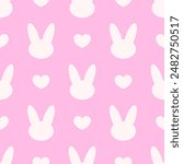 White bunnies heads silhouettes and hearts on pink background. Vector seamless pattern. Best for textile, print, wallpapers, and festive decoration.