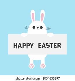 White bunny rabbit hanging on paper board template. Happy Easter. Paw print. Funny head face. Big ears. Cute cartoon character. Kawaii animal. Baby card. Flat design. Blue background. Vector