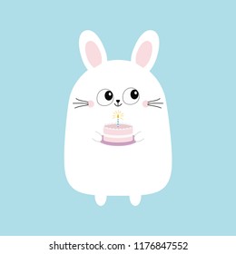 White bunny rabbit holding cake with candle. Funny head face. Big eyes. Cute kawaii cartoon character. Baby greeting card template. Happy Birthday sign symbol. Blue background. Flat design. Vector