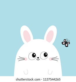White bunny rabbit looking at butterfly. Funny head face. Big eyes. Cute kawaii cartoon character. Baby greeting card template. Happy Easter sign symbol Blue background Flat design Vector illustration