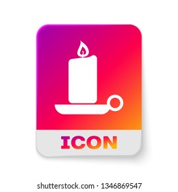 White Burning candle in candlestick icon isolated on white background. Old fashioned lit candle. Cylindrical aromatic candle stick with burning flame. Rectangle color button. Vector Illustration